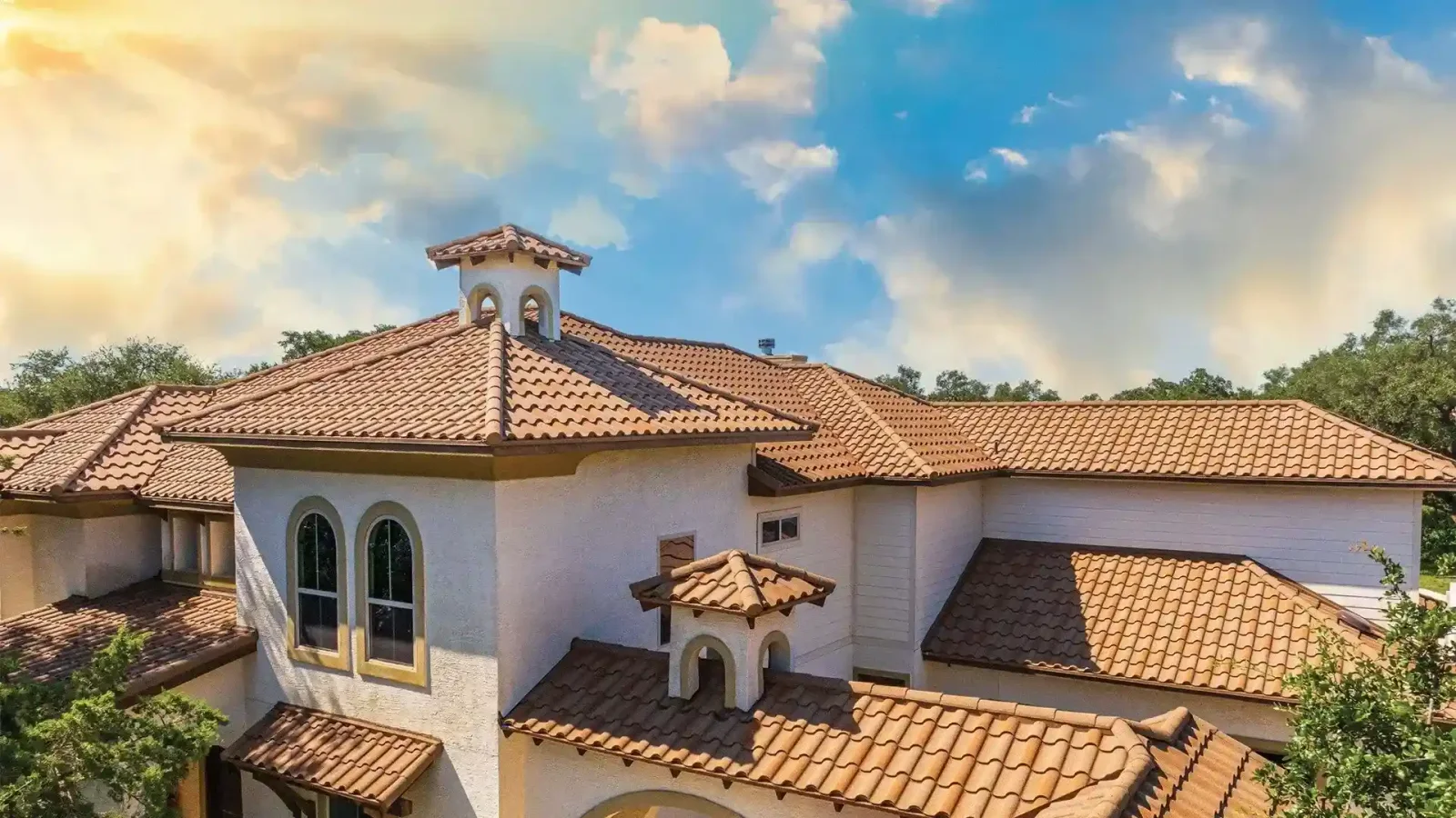 Residence with DECRA Villa Tile stone-coated steel roofing